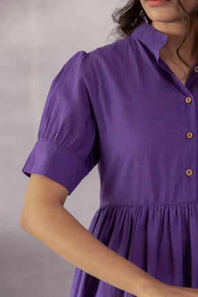 Purple cotton midi dress with short sleeves and buttoned front.