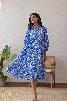 Blue and white cotton maxi dress worn by a woman.