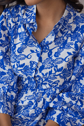 Blue and white floral cotton maxi dress close-up detail.