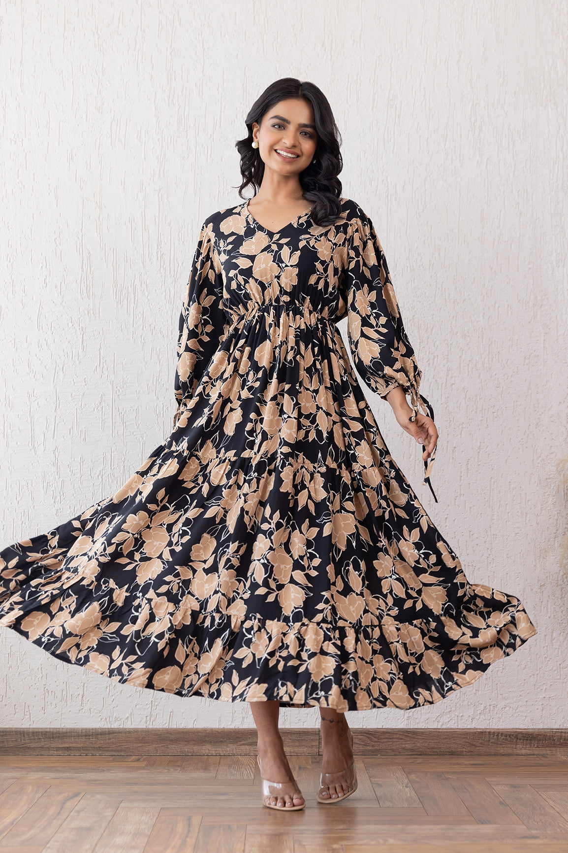 Elegant black and beige floral maxi dress for women.