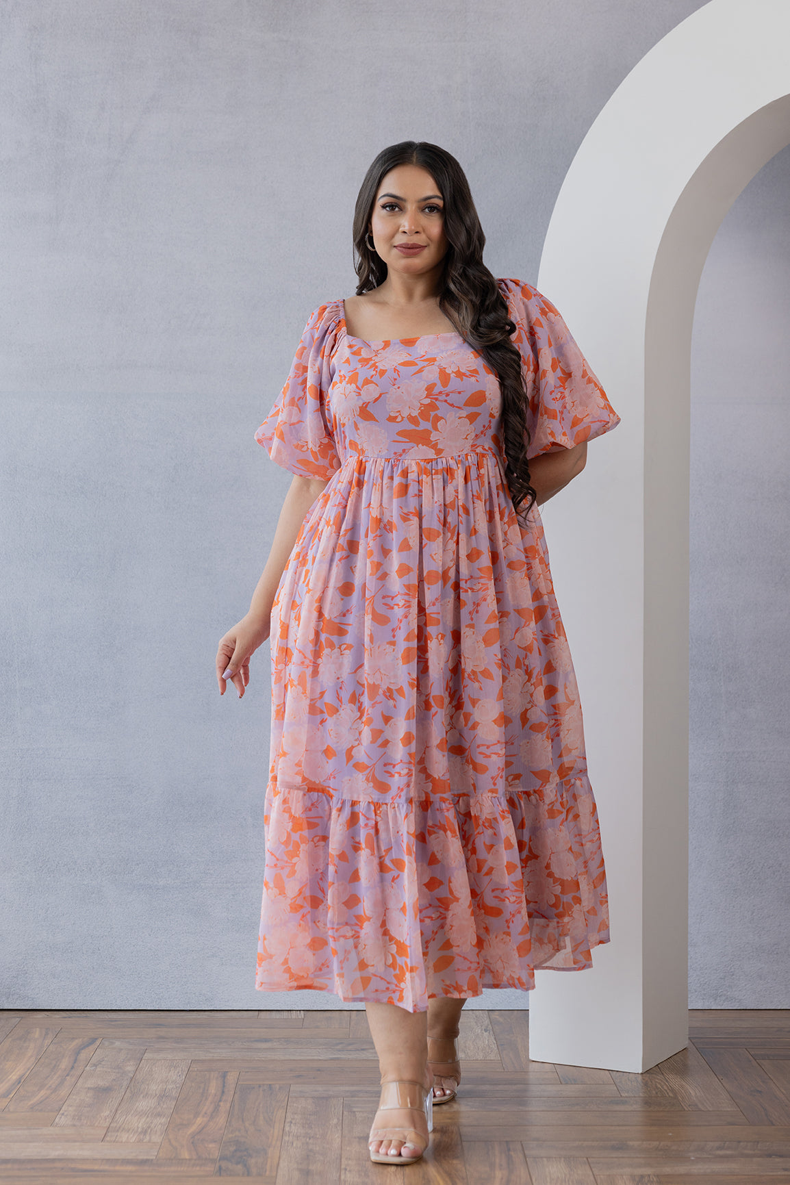 Pastel floral maxi dress from Polago Plus for stylish summer wear.